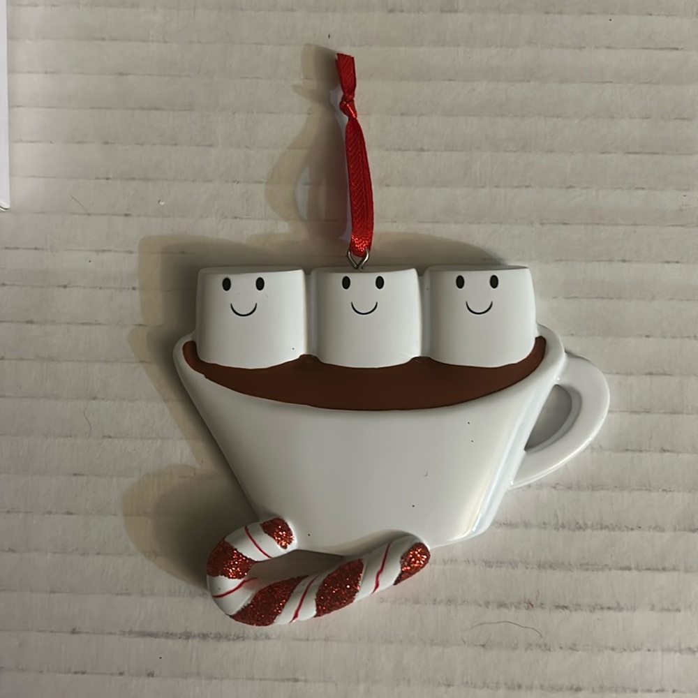 Hot chocolate mug ornament. Comes in original box.